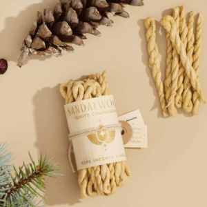 sandalwood incense bundle with pine christmas decor