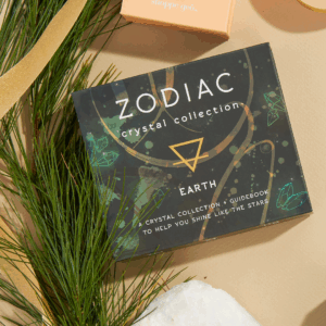 zodiac crystal collection for earth signs with pine and ribbon for christmas